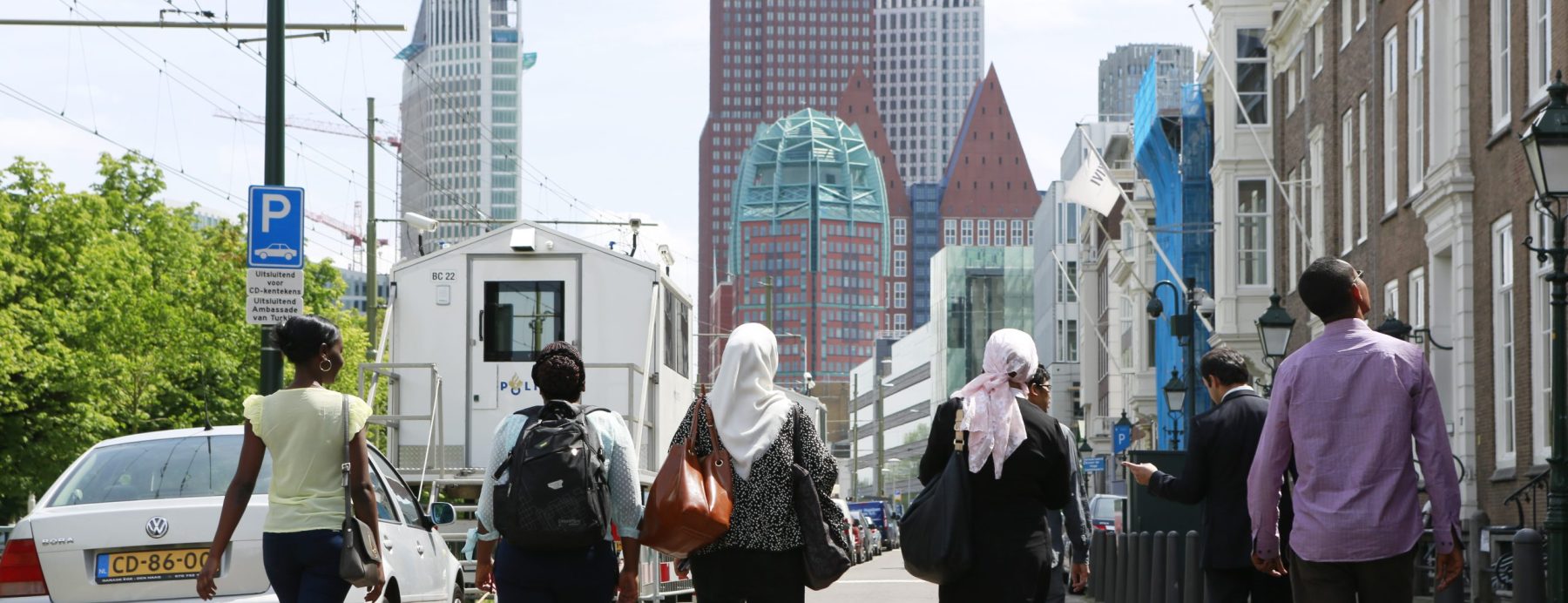 Homepage website banner 3 OT_Integrity_2015_SV_tour The Hague_participants walking_men_women_action