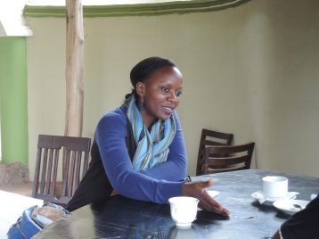 TMT_ACCU Uganda_2016_P_participant talking_women_Africa copy