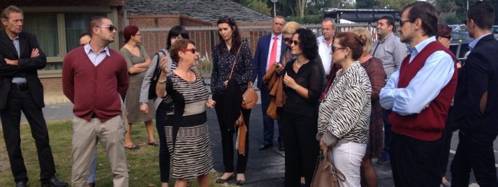 TMT_CoProl Albania_2014_SV_outside_participants listening_men_women_Europe