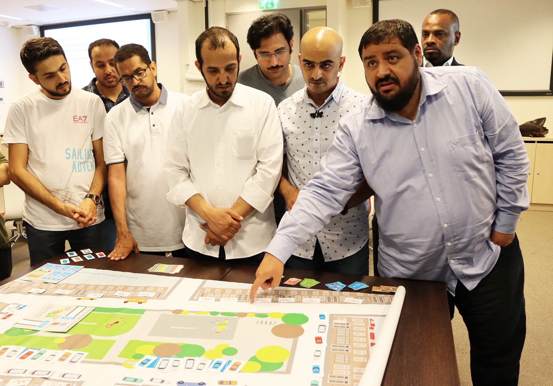 TMT_KSA_2019_CR_group work_participant talking_men_MENA_action copy