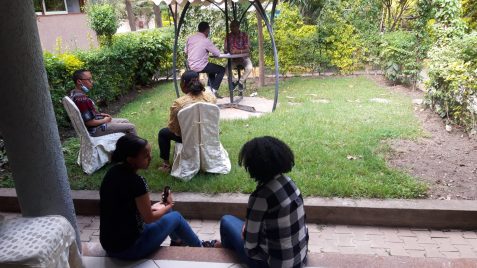 TMT_WaA_Ethiopia_2022_CR_participants chatting in garden_feel good